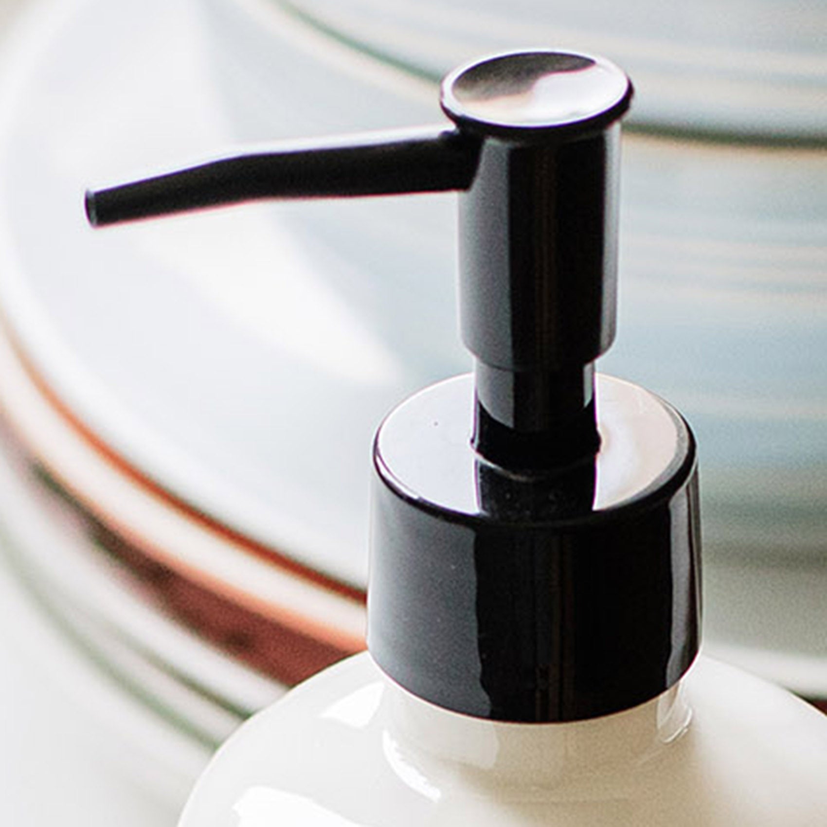 Buse noire pour distributeur de savon