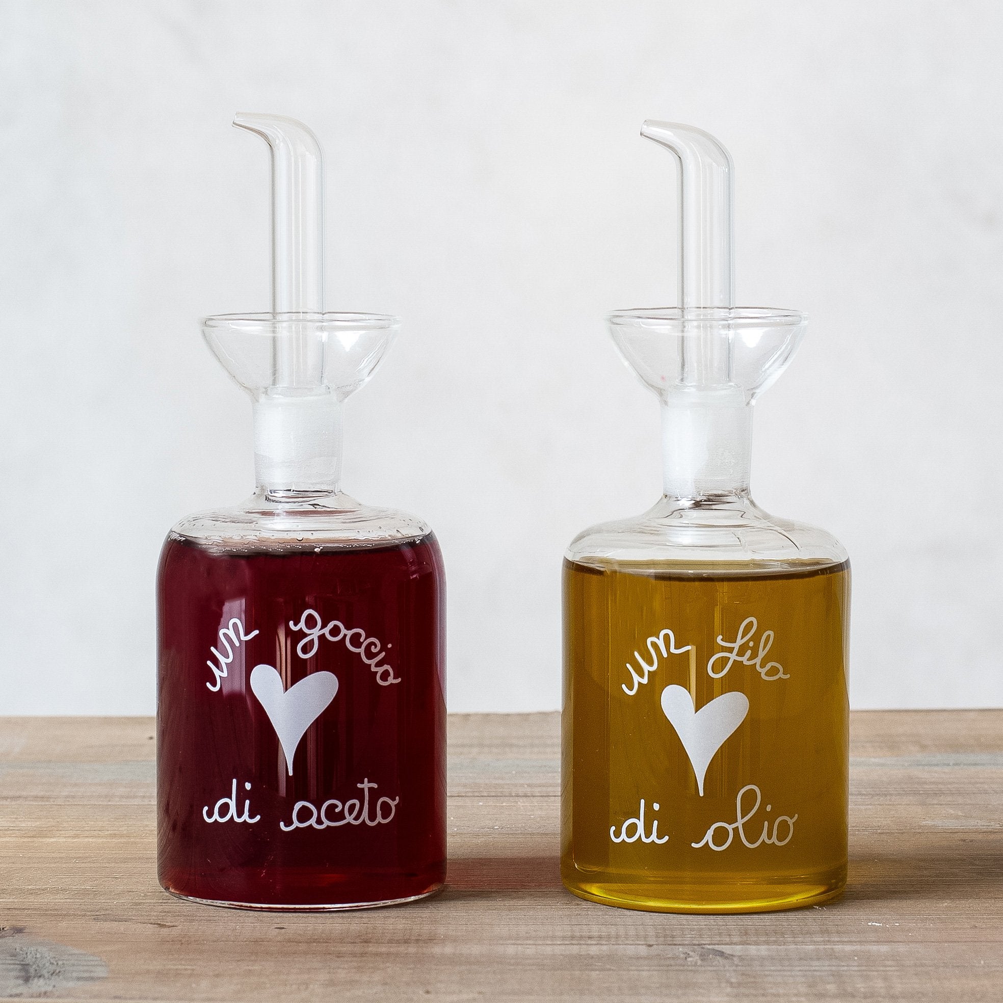 Establecer 2 botellas una llovizna de aceite: una gota de vinagre de 2x250 ml